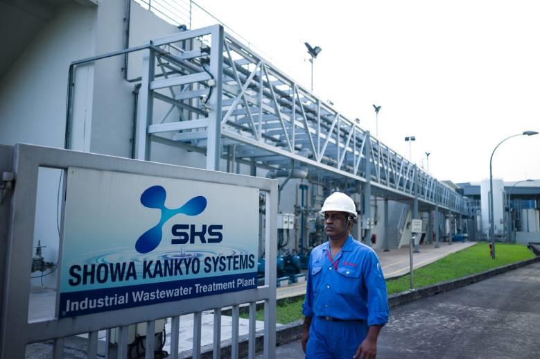 Technician walking outside the SKS site in Singapore