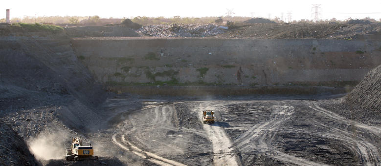 production of biogas from buried waste