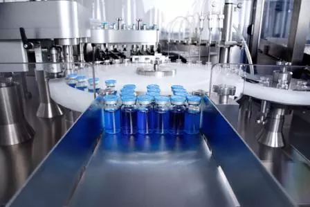 Chain with vials in the pharmaceutical industry